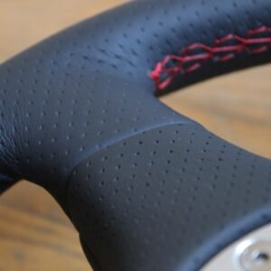 Sellerie-lotus-volant-cuir-perfore-003 Sellerie-lotus-volant-cuir-perfore-003