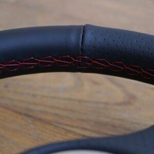 Sellerie-lotus-volant-cuir-perfore-004 Sellerie-lotus-volant-cuir-perfore-004